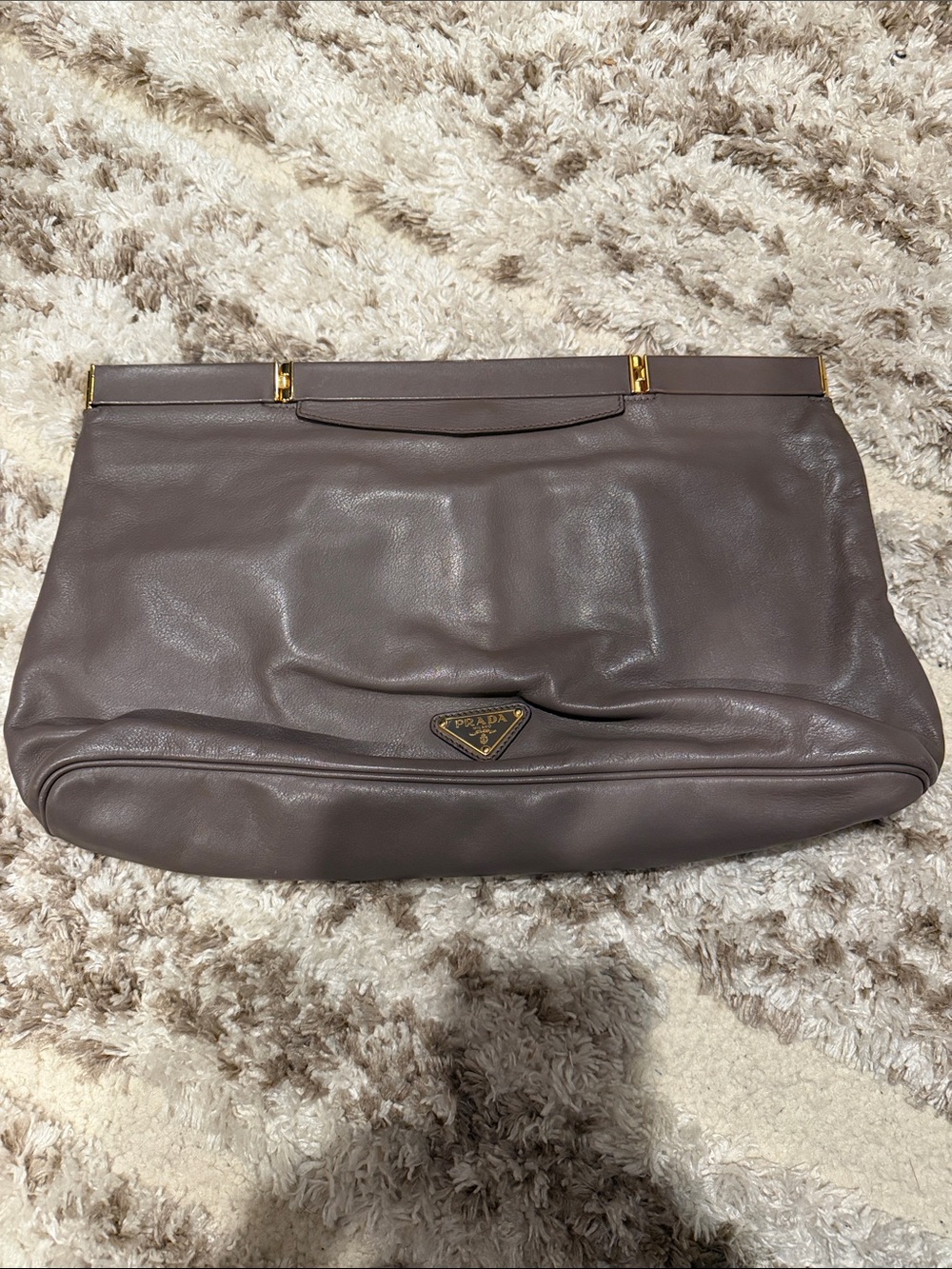 Prada Mauve Leather Clutch with Gold-Tone Accents